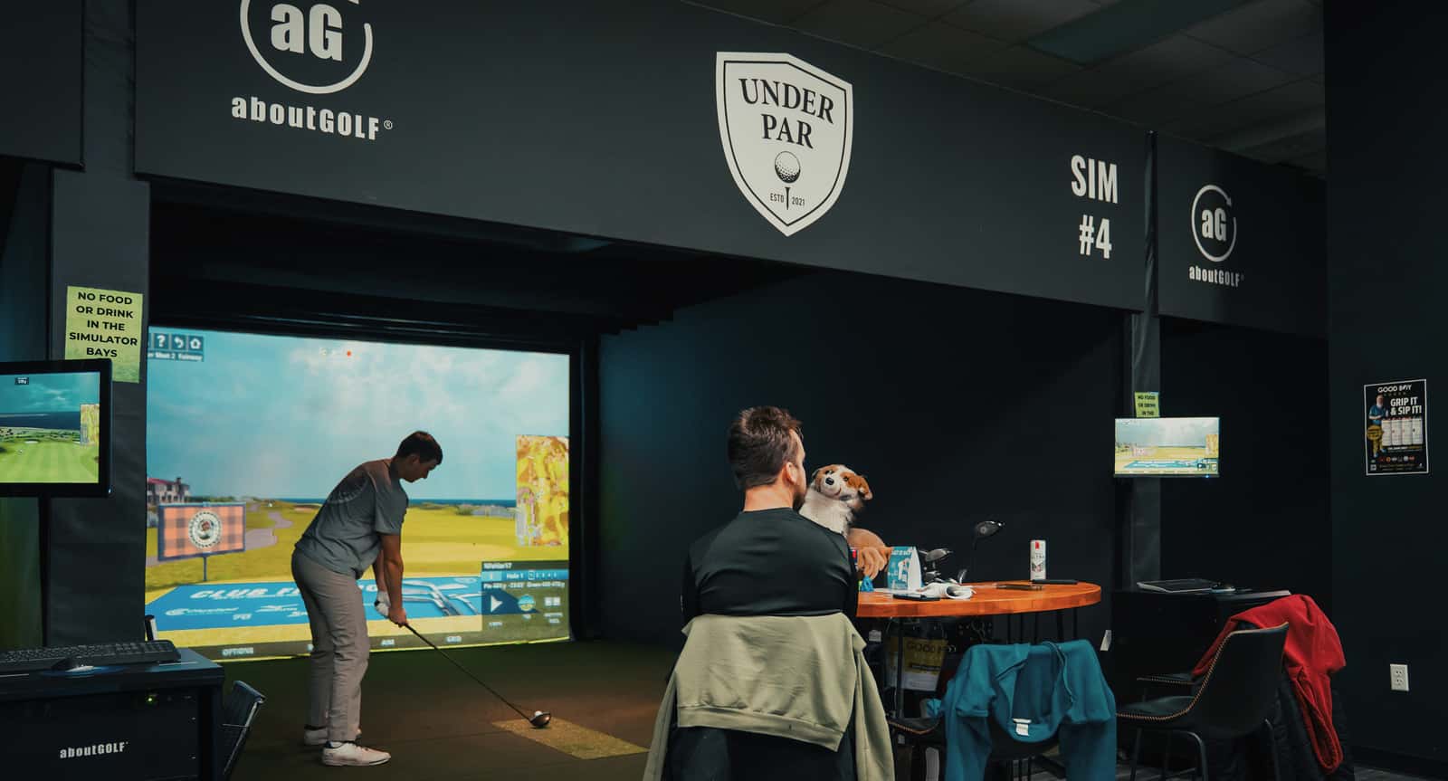 Golfers playing a round at Under Par Golf